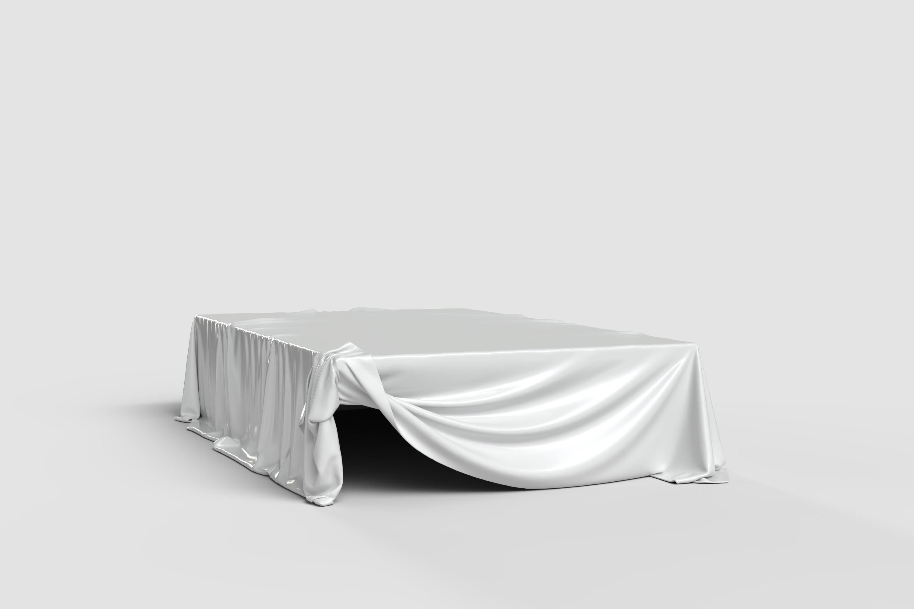 Capturing the ephemeral grace of draped fabric, the Levitaz Coffee Table in White Gloss is a masterclass in sculptural design. Its contours, evocative of a silken veil caught in a gentle gust, freeze a moment of fluid elegance in time. The table’s