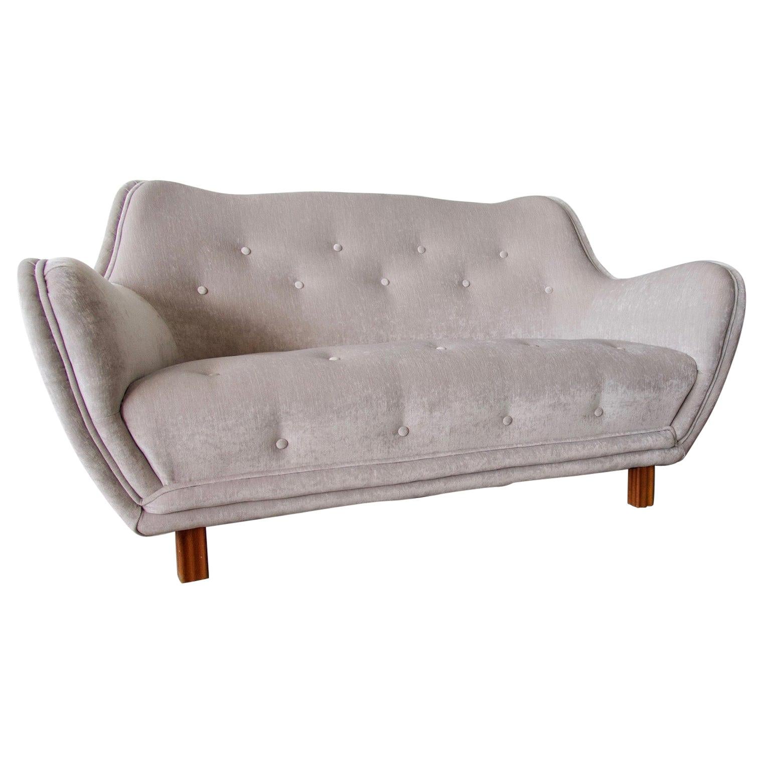 Levy Carlson’s Mobelafarr Button Tufted Grey Velvet Sofa