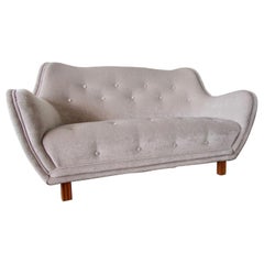Levy Carlson’s Mobelafarr Button Tufted Grey Velvet Sofa