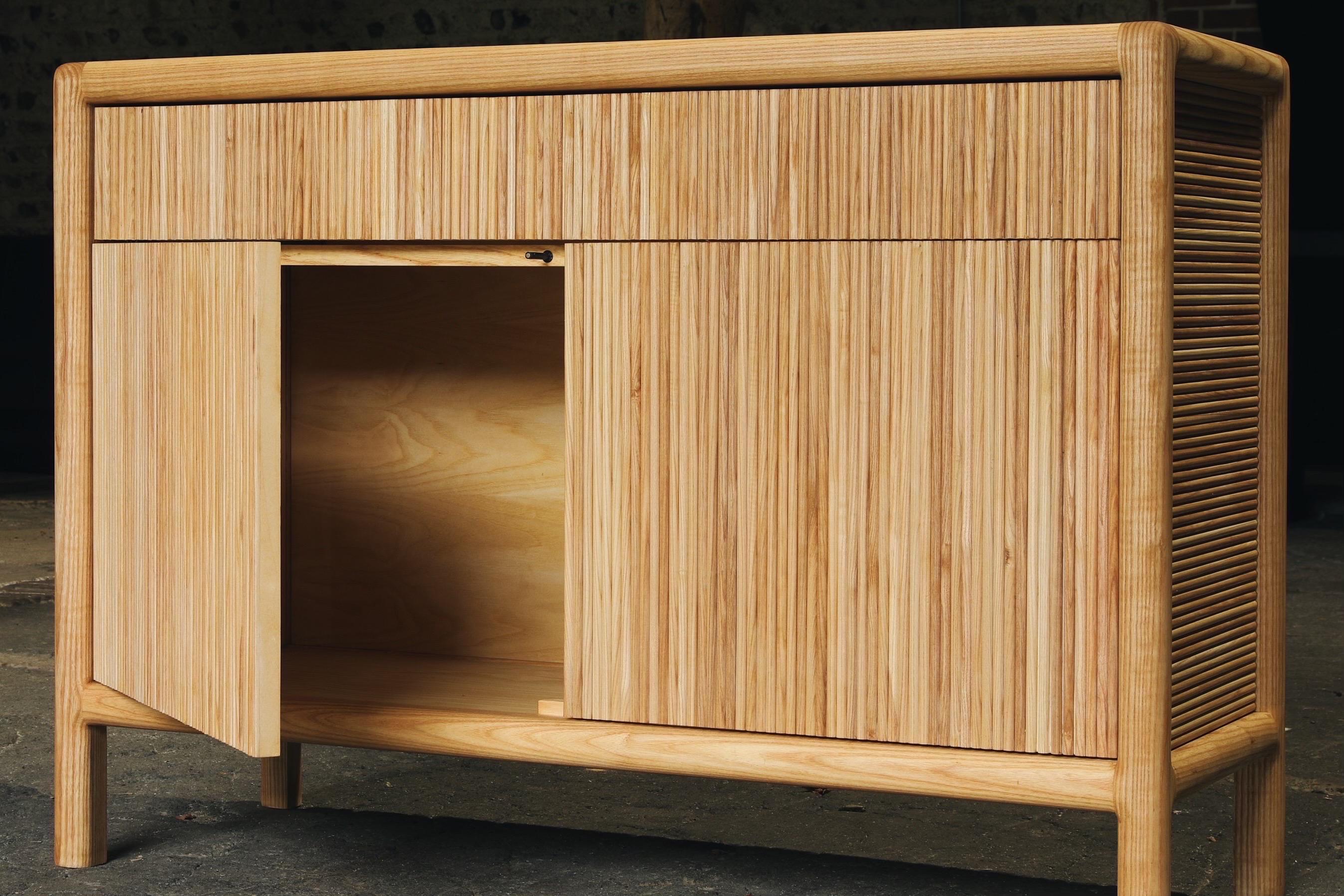 Hand made using English ash, this sideboard has nearly 400m of half round solid ash hand fixed to the outside of the cabinet.

Easily a piece that will last a lifetime and one that will stand out in any bodies home.

Size of one pictured 1200w