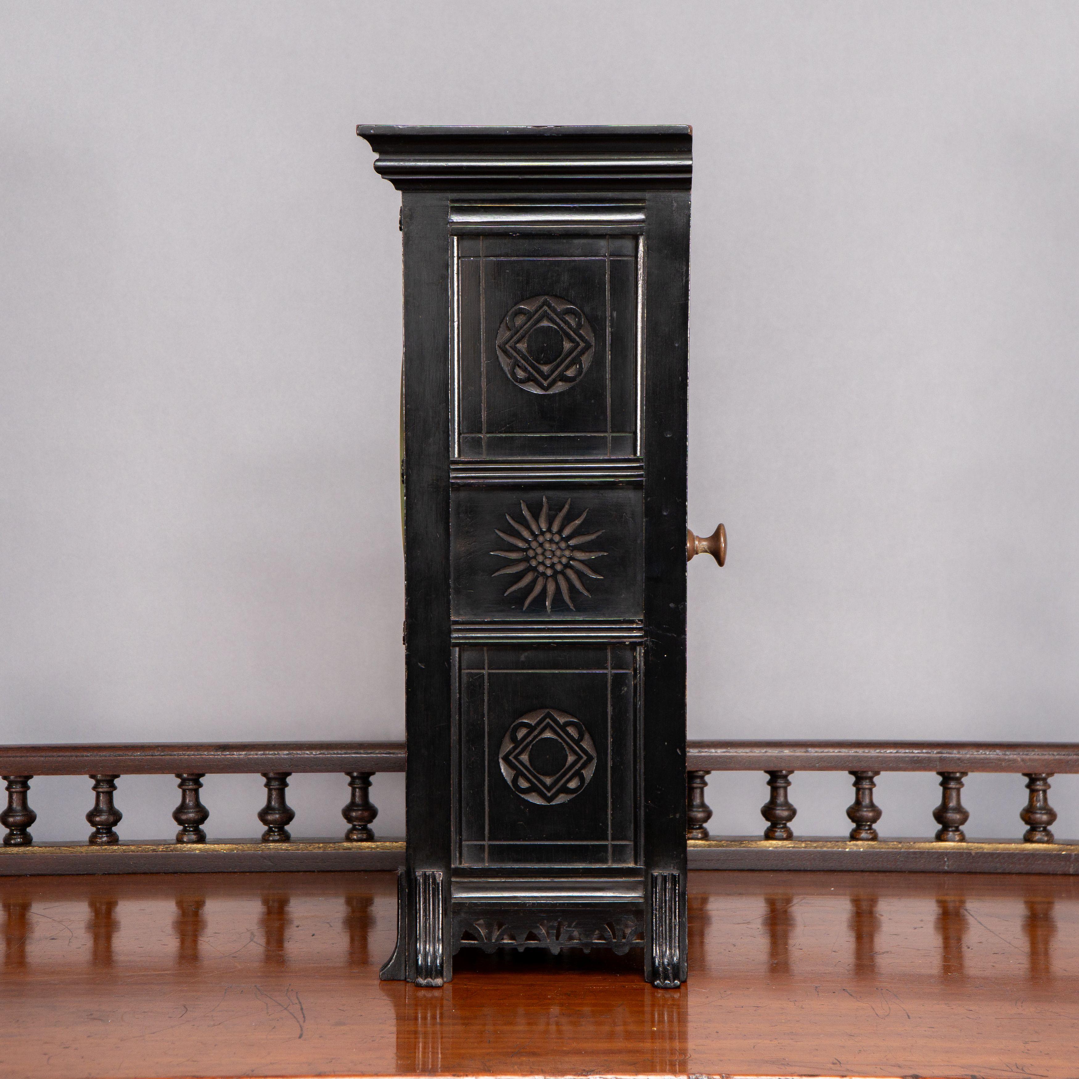 British Lewis Foreman Day. Made by Howell and Sons. An Aesthetic Movement ebonized clock For Sale