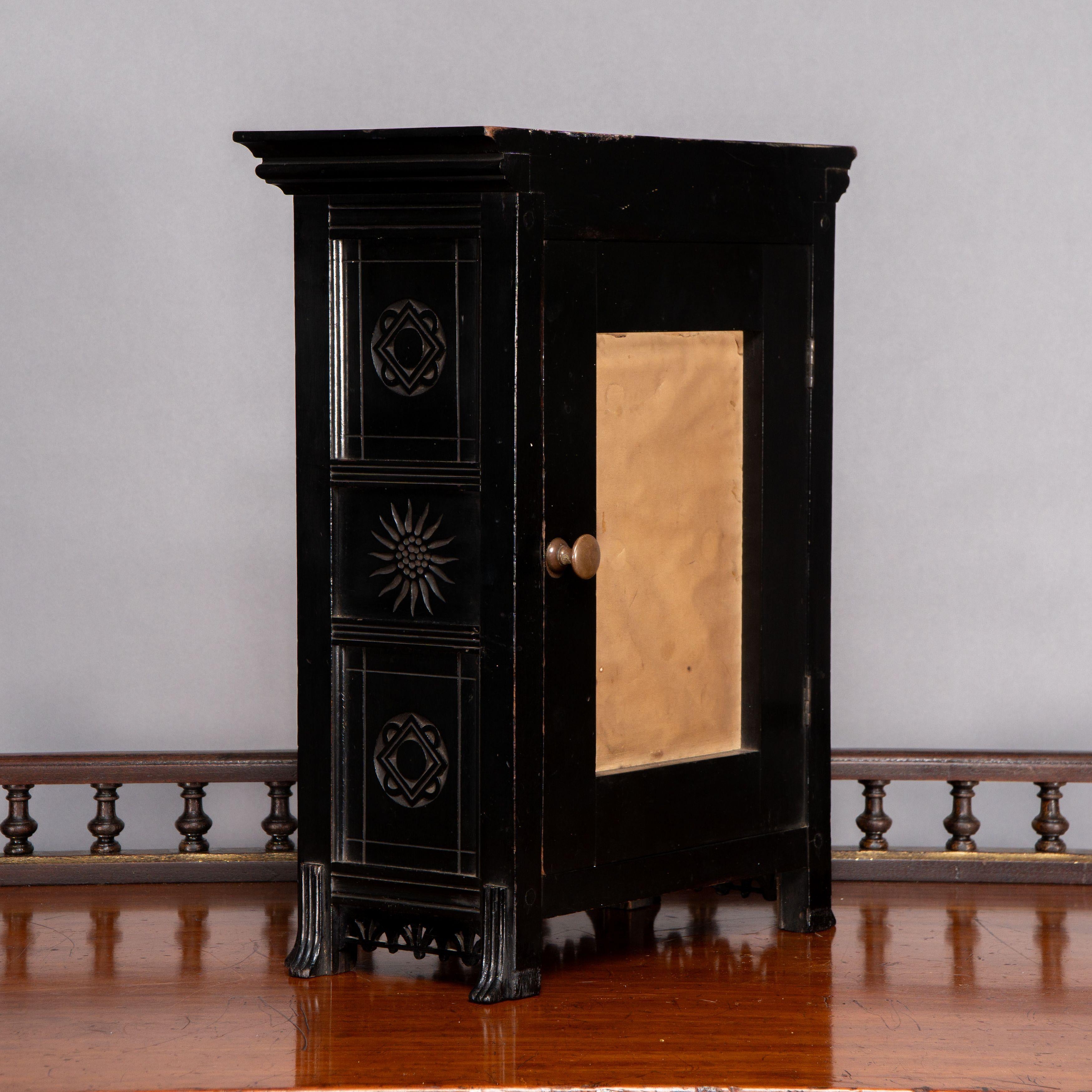Lewis Foreman Day. Made by Howell and Sons. An Aesthetic Movement ebonized clock In Good Condition For Sale In London, GB