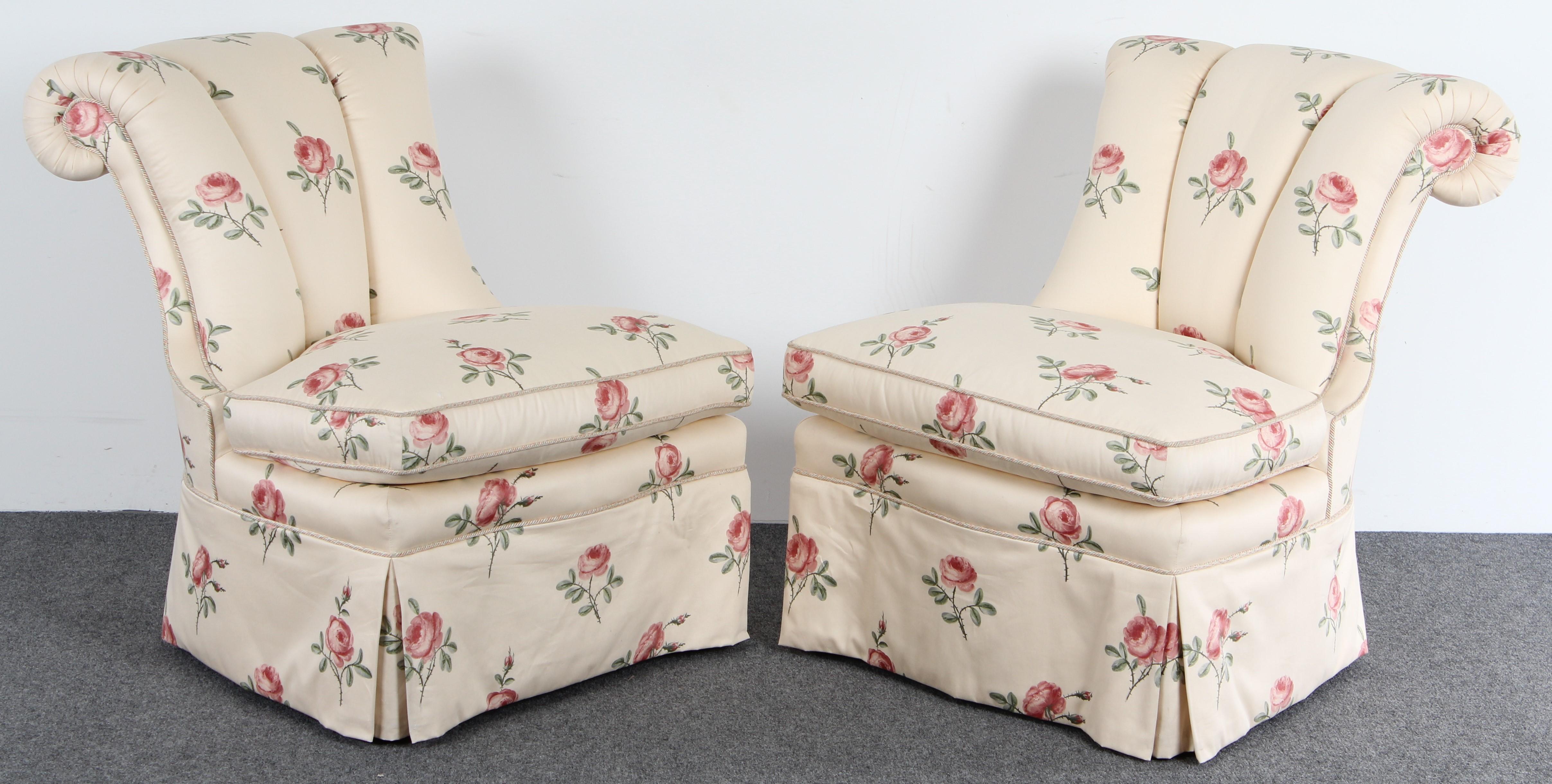 Pair of armless Napoleon III slipper chairs by Lewis Mittman, Inc. The high-quality chairs have original floral chintz upholstery. These comfortable Hollywood Regency style chairs would look great in any modern or traditional home. They have great