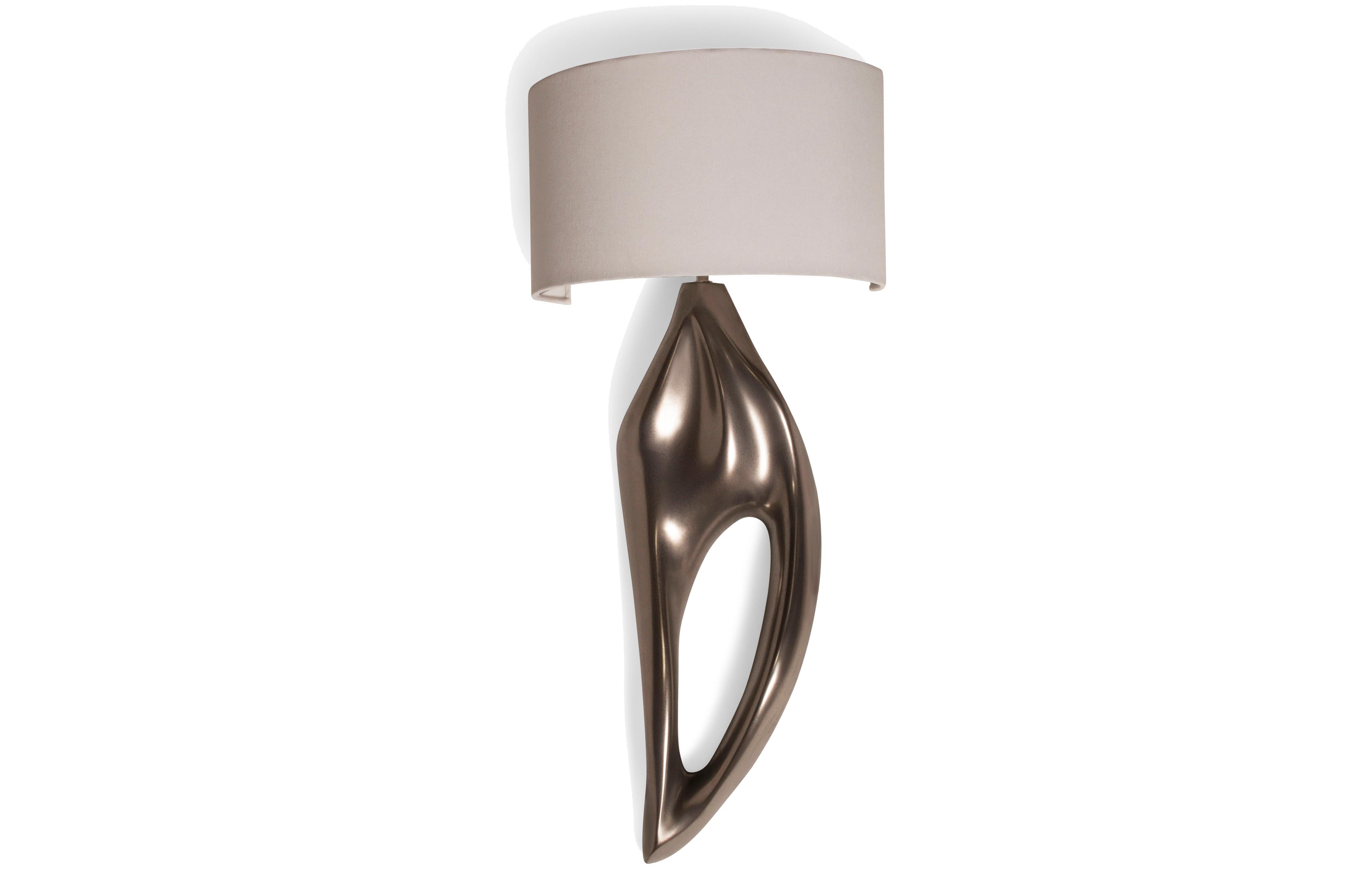 Oralee sconces is from solid walnut wood and stained natural. 
Shade dimensions: 12