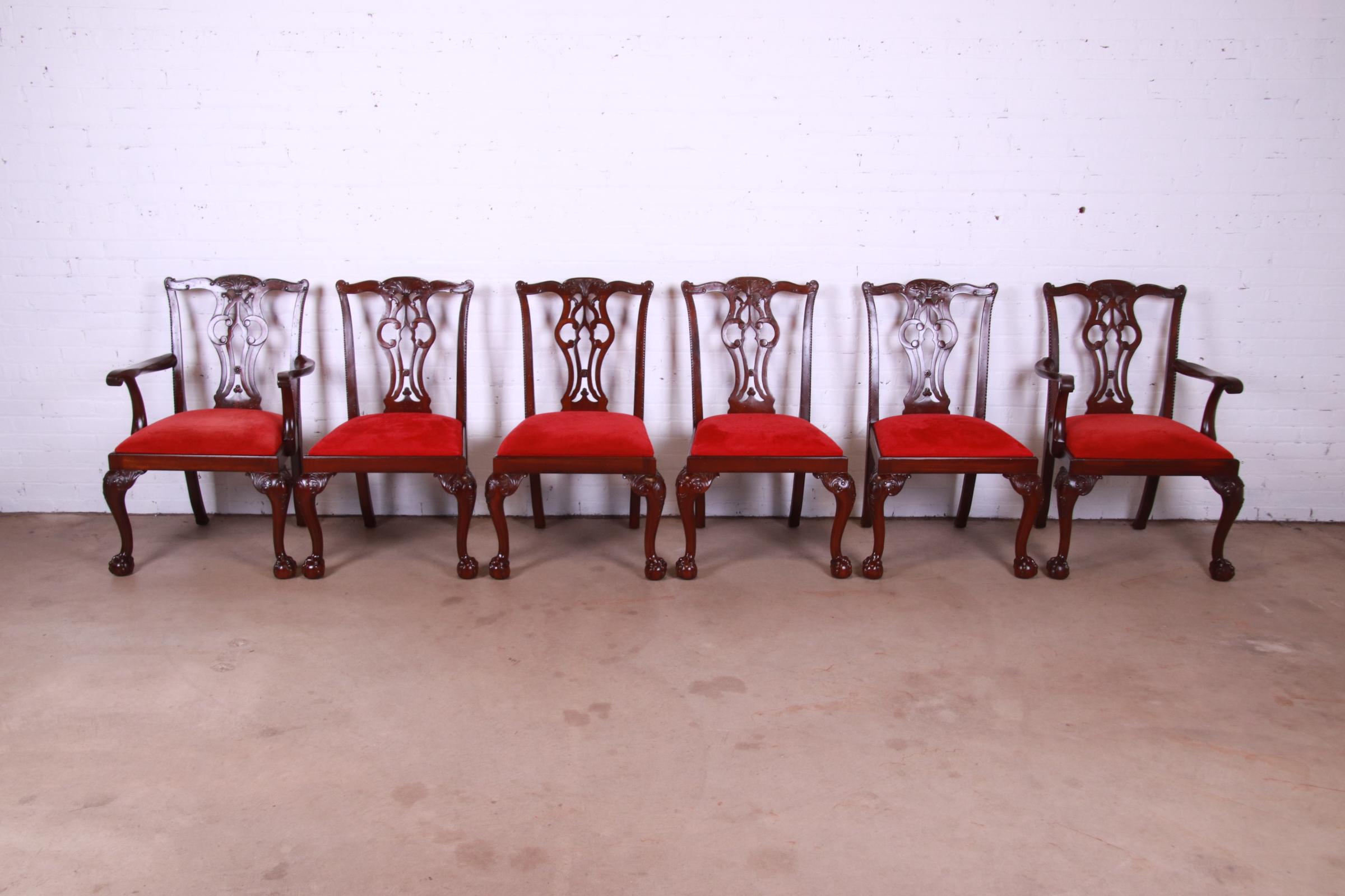 A gorgeous set of six Chippendale style dining chairs with ball and claw feet

By Lexington Furniture

USA, Circa 1980s

Solid carved mahogany frames, with red velvet upholstered seats.

Side chairs measure: 24.5