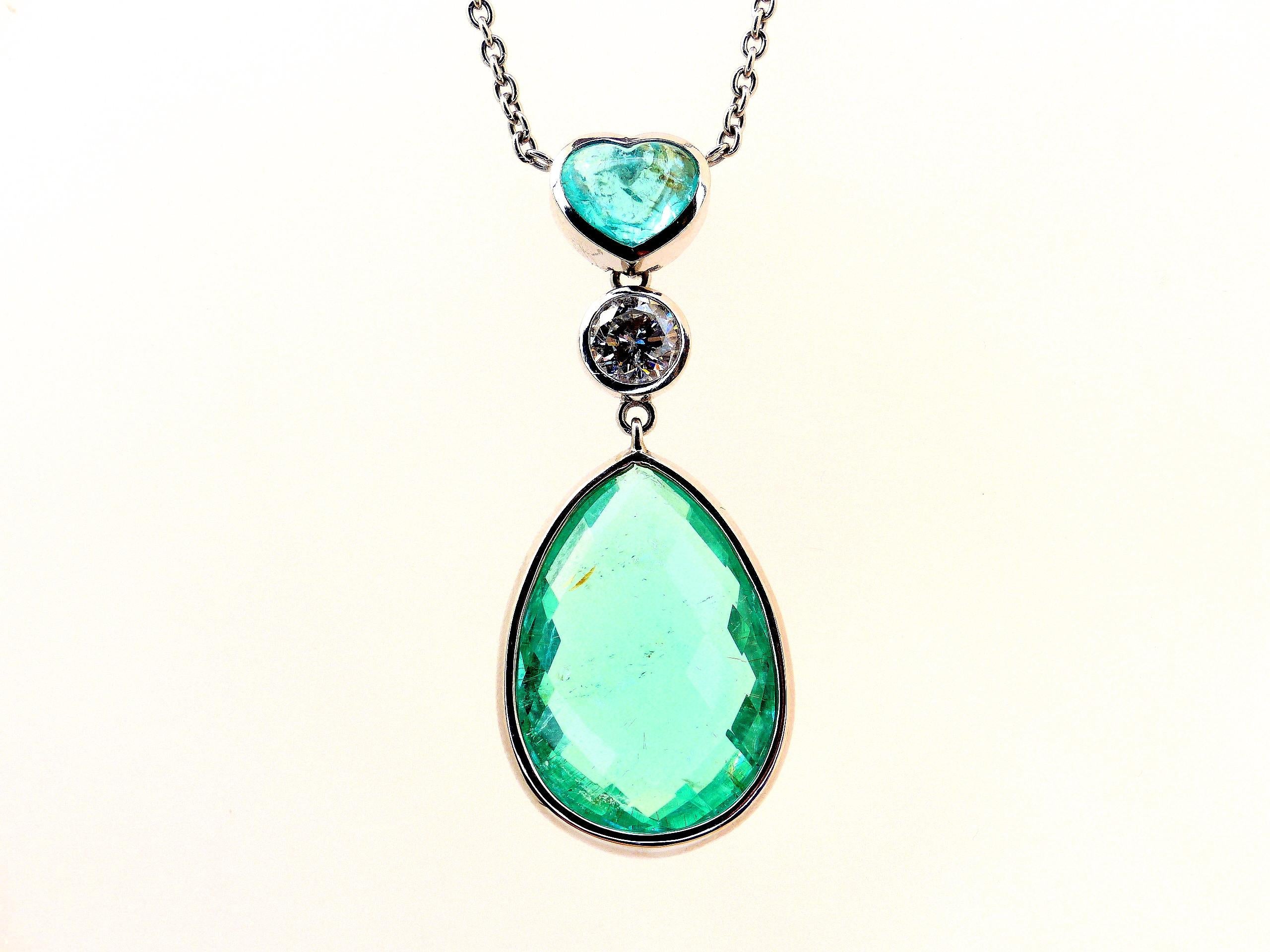 This 950/ Platinum (9.90g) Pendant is set with 1x fine Paraiba Tourmaline (Briolette-cut, 28x20x10mm, 38.79ct) + 1x Diamond (Brilliant-cut, 1.65ct, round 6.8mm, G/P2).

Paraiba Tourmalines are very popular and rare gemstones. The color is electric
