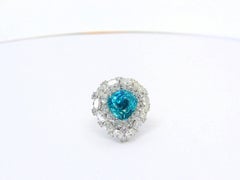Ring in Platinum with 1 blue/green Paraiba Tourmaline Pearshape and Diamonds
