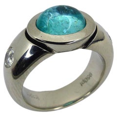 Ring in Platinum with 1 blue/green Paraiba Tourmaline Cabouchon + 2 Diamonds