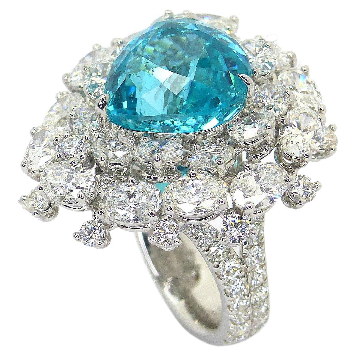 Ring aus Platin mit 1 blauem/grünem Paraiba-Turmalin in Birnenform und Diamanten 