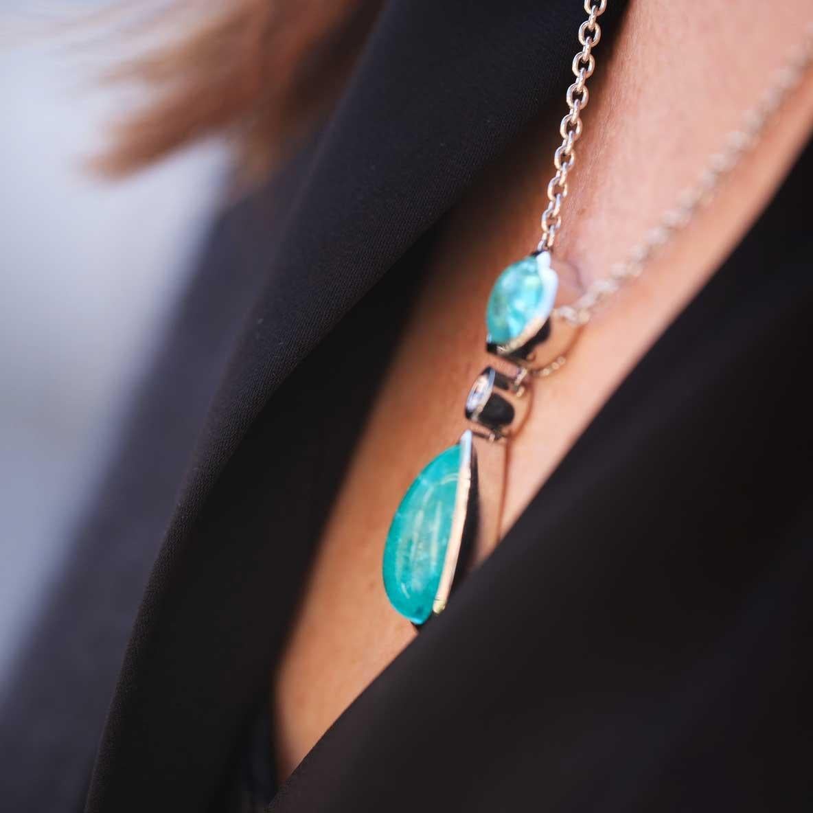 Contemporary Necklace in Platinum with 1 blue/green Paraiba Tourmaline Cabouchon Heart. For Sale