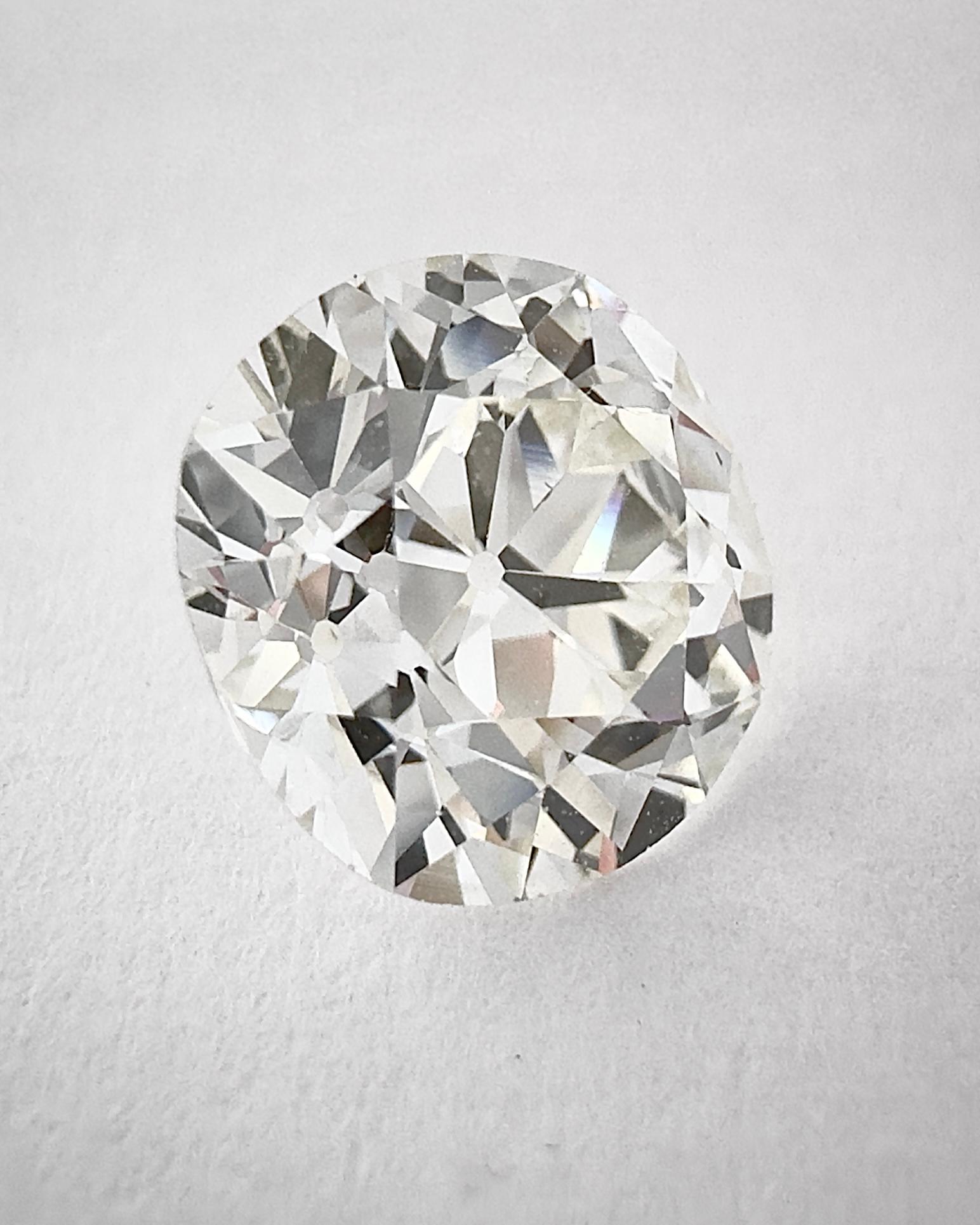 This Antique Old Mine Cushion Brilliant cut Diamond weights 2.12 carats with a J color (Beautiful white face up) and VVS2 Clarity (Loupe Clean).
The high quality of its cut let the stone reveal an incredible brightness.
What is interested with