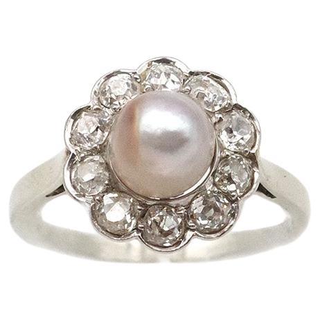 LFG certified natural pearl cluster ring, Belle epoque, 0.70 ct diamonds For Sale