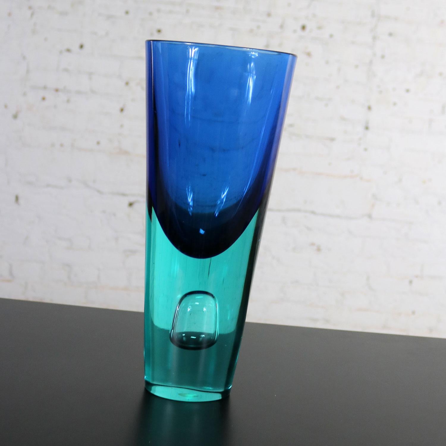 Incredibly large and heavy Murano Sommerso glass vase in blue and turquoise with encapsulated large bubble in the base. This beautiful vase is not signed but in the style of Antonio da Ros for Cenedese. It is in wonderful vintage condition. There