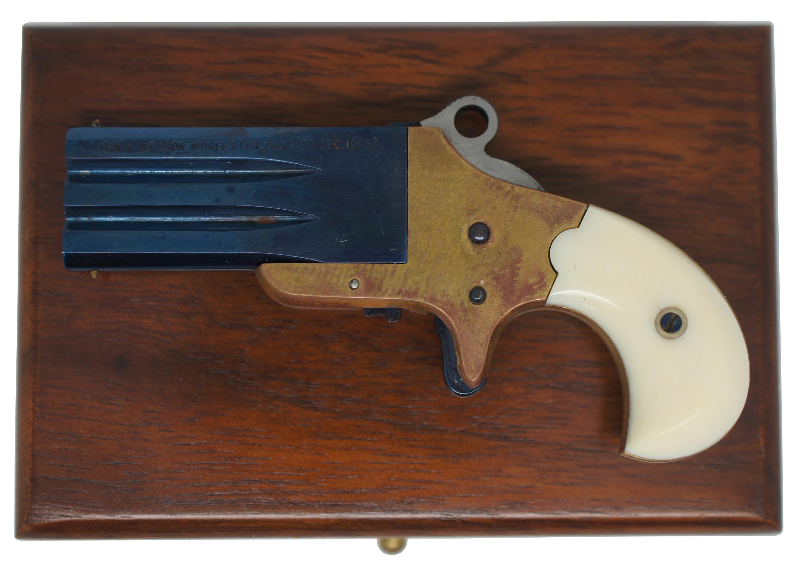 Vintage L.H. Smith miniature Frank Wesson swivel barrel two shot derringer pin fire cap gun and velvet lined walnut case marked “L.H. Smith 5.” Includes full set of blank cartridges and ram rod.

Gun - 2.5” x 0.5” x 1.25” / Case - 2.875” x 2” x