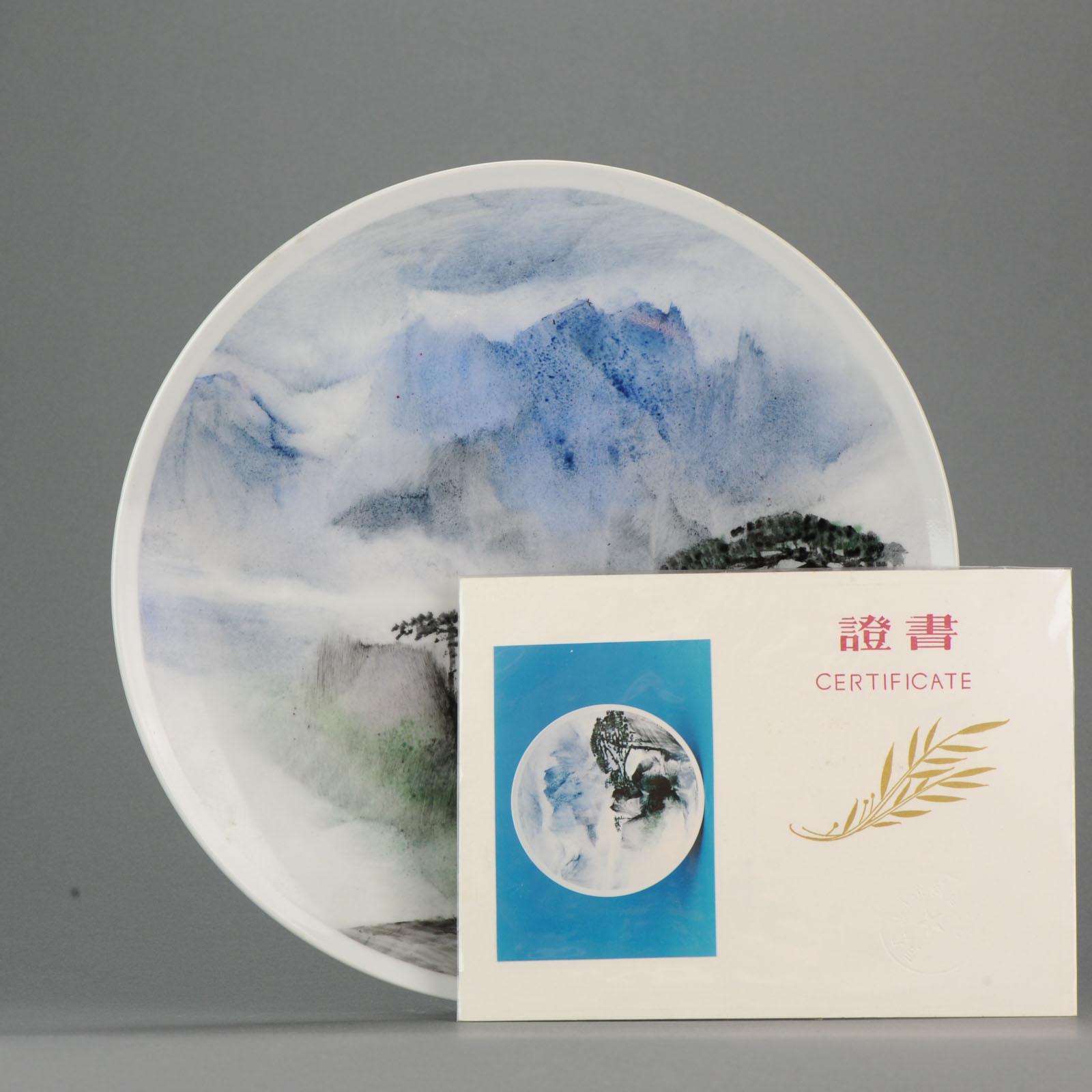 A very lovely large plate by Li Linhong (born 1942). This polychrome porcelain dish, depicting Mount Huangshan. Li Linhong (1942) was director of the section elementary education and research of the department Visual Arts of the Jingdezhen Ceramic
