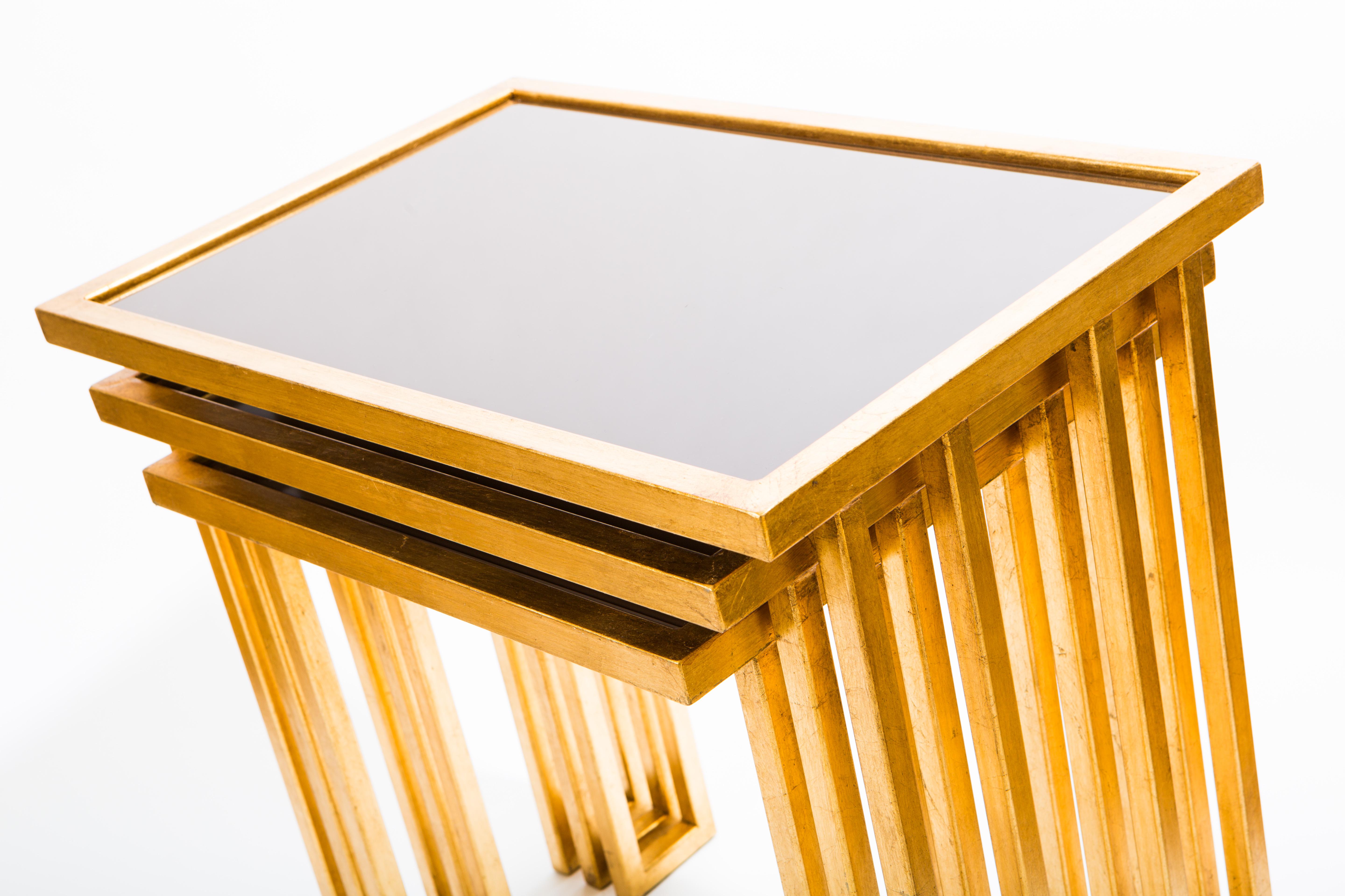 Forged Li Puma Firenze Unique Nesting Tables in 24 Ct Gold Leaf with Bronze Glass Tops For Sale