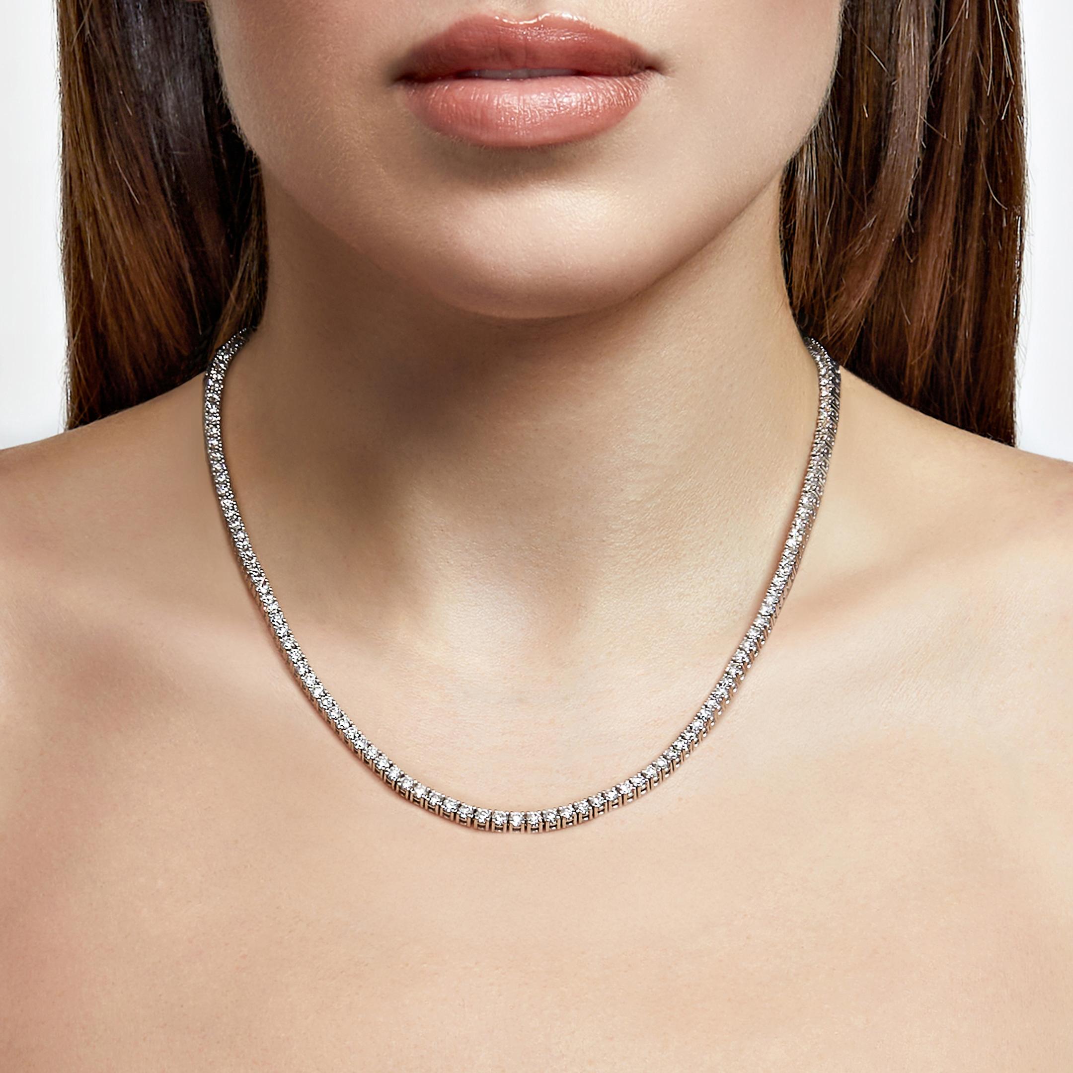 Everyone needs a perfect diamond tennis necklace in their accessory rotation. This 20-inch diamond line necklace with 15.50 carats of diamonds is just the piece to add to your wardrobe. You can dress it for a formal black-tie event or keep it super