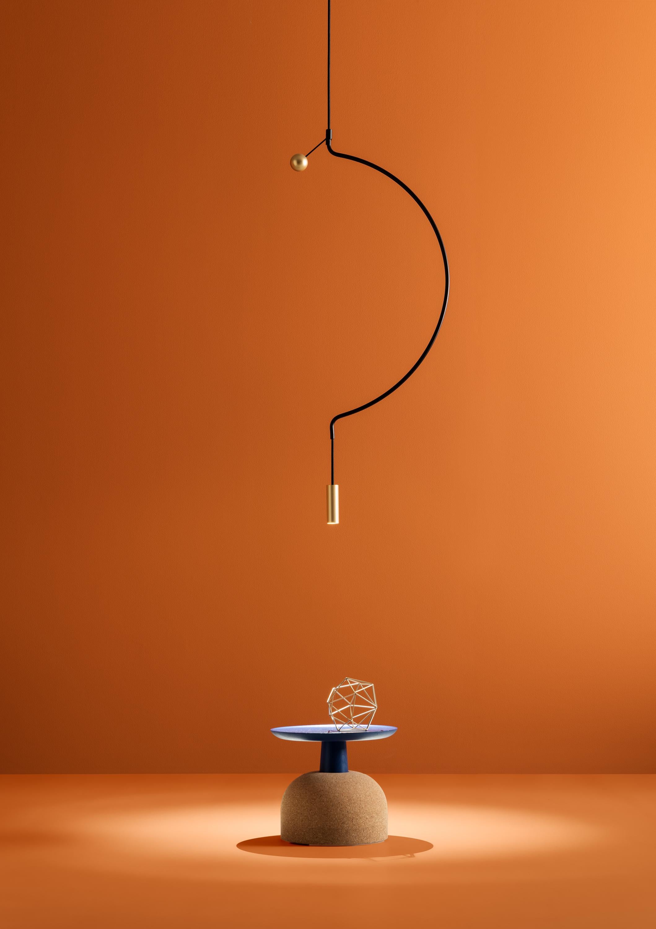 Liaison tells about the perfect balance of three geometric archetypes: sphere, circle and cylinder compose a system that includes the single pendant and as well as the multiple compositions.
Unique and precious, Liaison is a metal suspension that