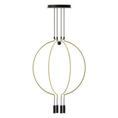 Liaison M4 Luce modulare ed eleganza in un pendente quadruplo di medie dimensioni