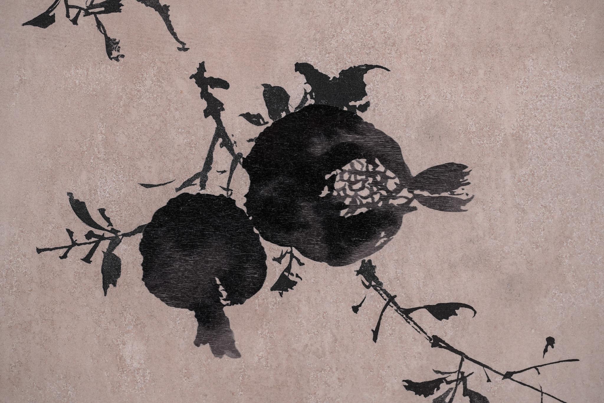 At first glance, this piece seems like a classic Chinese ink painting, but a closer look reveals a quiet surprise: the full, ripened pomegranates are stitched entirely by hand. Every gradation of ink from deep black to soft gray, from dry strokes to