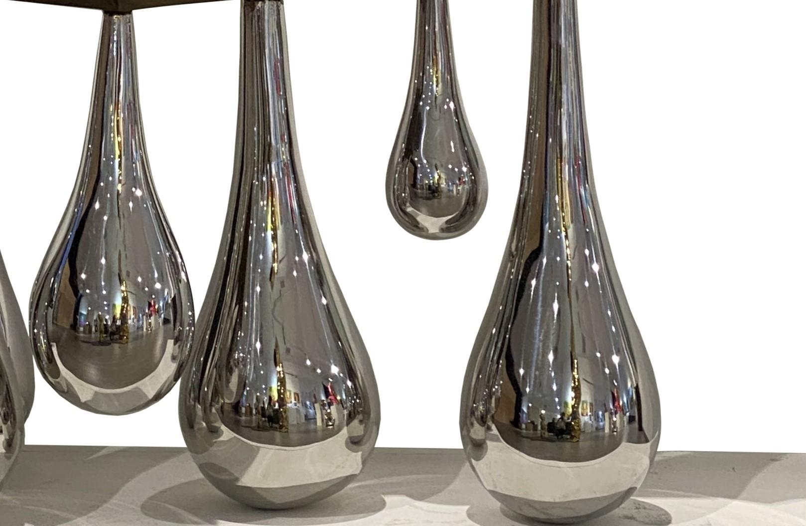 Momento opportuno 晴时多云偶阵雨 （Edizione di 6)

Scultura pluripremiata - 
2015  Mostra Nazionale d'Arte Scultura - Premio Oro
2017 Certificato di eccellenza, premio di design Arts & Crafts.

La parte superiore è una nuvola che rivela vagamente una forma