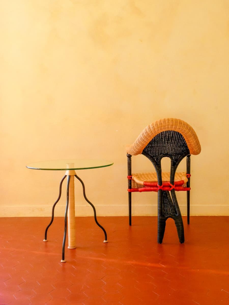 Mid-Century Modern Liba rattan chair, 1988 by Bořek Šípek for Driade and a glass coffee table For Sale