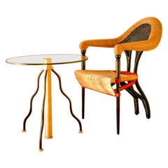 Silla de ratán Liba, 1988 de Bořek Šípek para Driade y mesa de centro de cristal