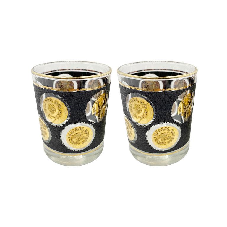 A great way to add a little sparkle to your bar rotation. These glass drinking glasses by Libbey are decorated with a gold rim, and round coin medallions throughout, on a textured black background. 

Dimensions:
3
