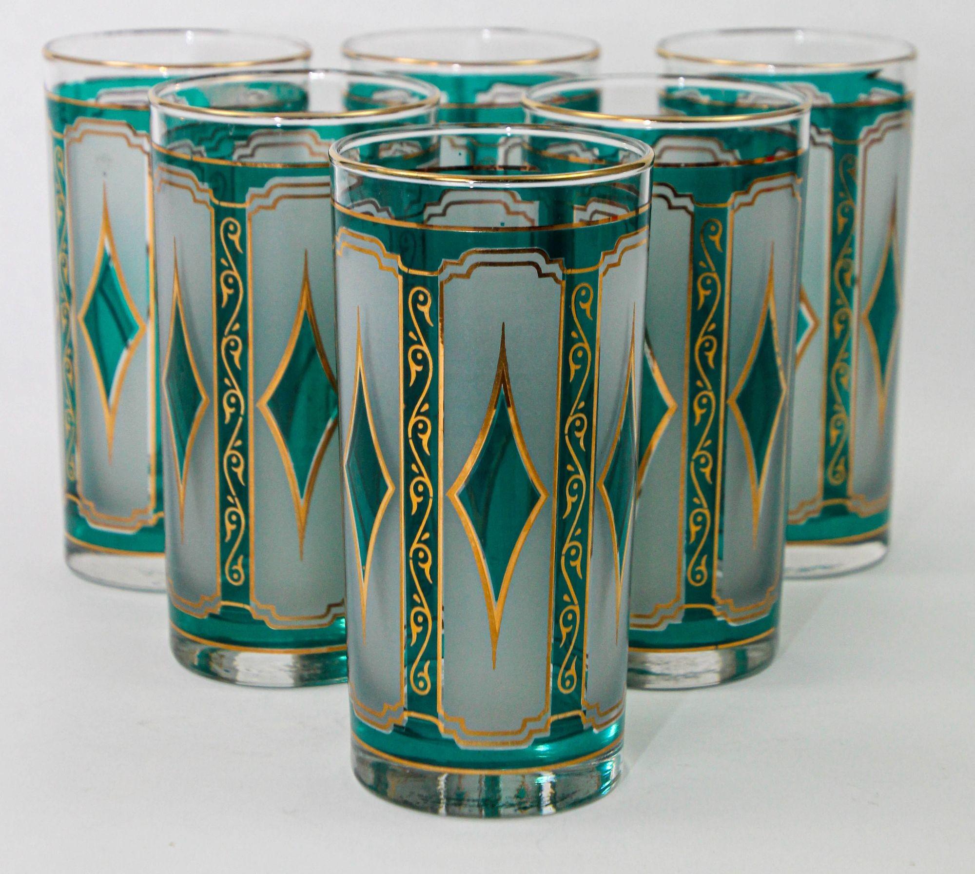 Libbey Emerald Green with 22-Karat Gold Diamond Glasses set of 6.
Libbey 1960s Emerald Blue and 22-Karat Gold Diamond Drinking Glasses.
The blue diamond graphics have a stained glass type of feel to them, while the gold detailing on the glasses is