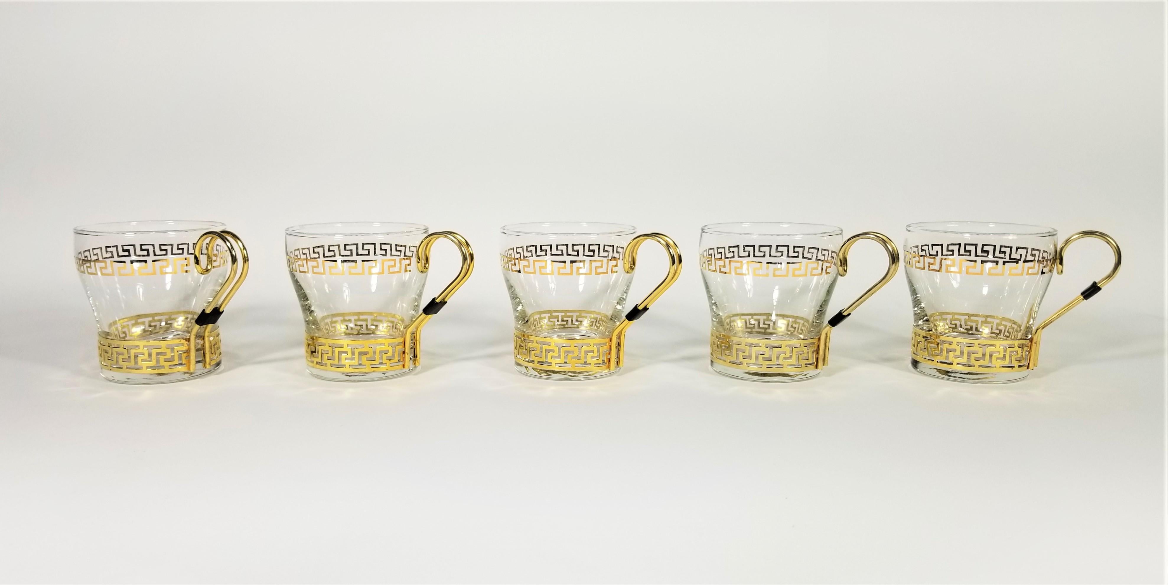 Midcentury libbey glassware barware with gold Greek key design. Set of 5.

Measurements:
Height 3.25 inches
Diameter top of glass 3.0 inches
Diameter including handle 4.25 inches.