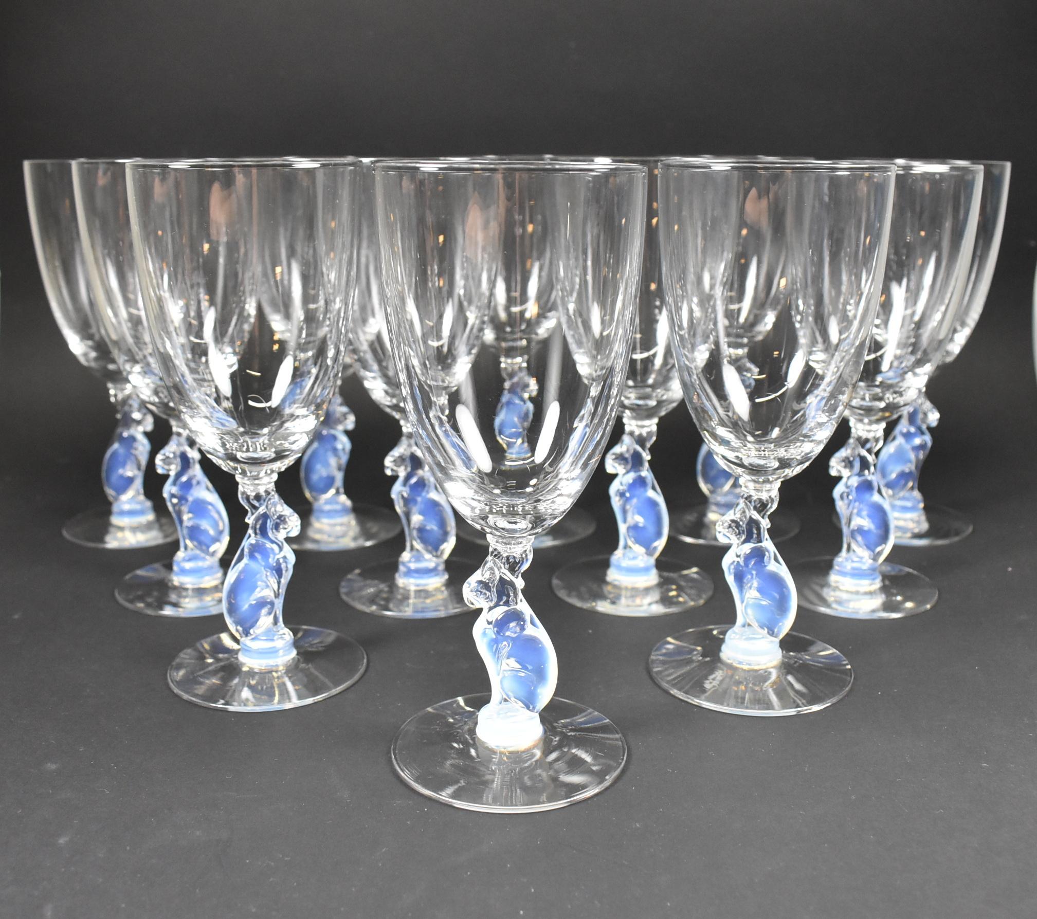 Rare 1933 Libbey Silhouette Nash Series moonstone water goblets with charming cat stems in opalescent glass designed by Douglas Nash. Libbey mark is acid etched on the bottom. 7