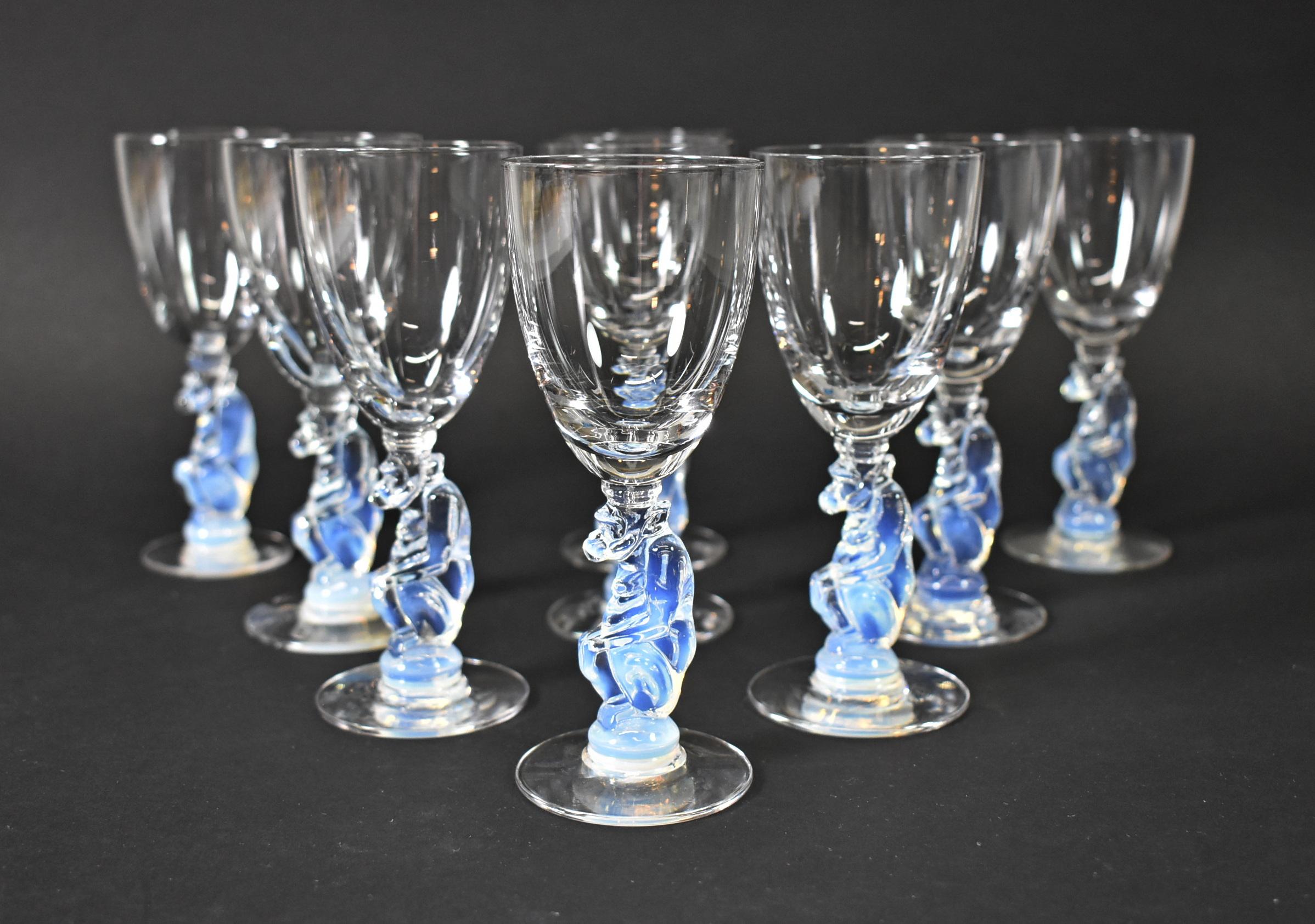 Rare 1933 Libbey Silhouette Nash Series moonstone sherry glasses with charming monkey stems in opalescent glass designed by Douglas Nash. Libbey mark is acid etched on the bottom. 4 7/8