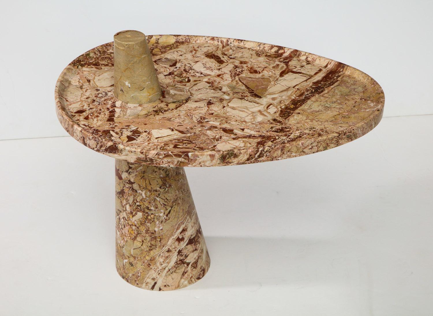 Solid cone base with removable carved tray that cantilevers. “Libeccio” refers to one of 8 winds that blow through Sicily. These tables will be made in a series of varied original designs, produced in Sicily using local artisans and local stones.