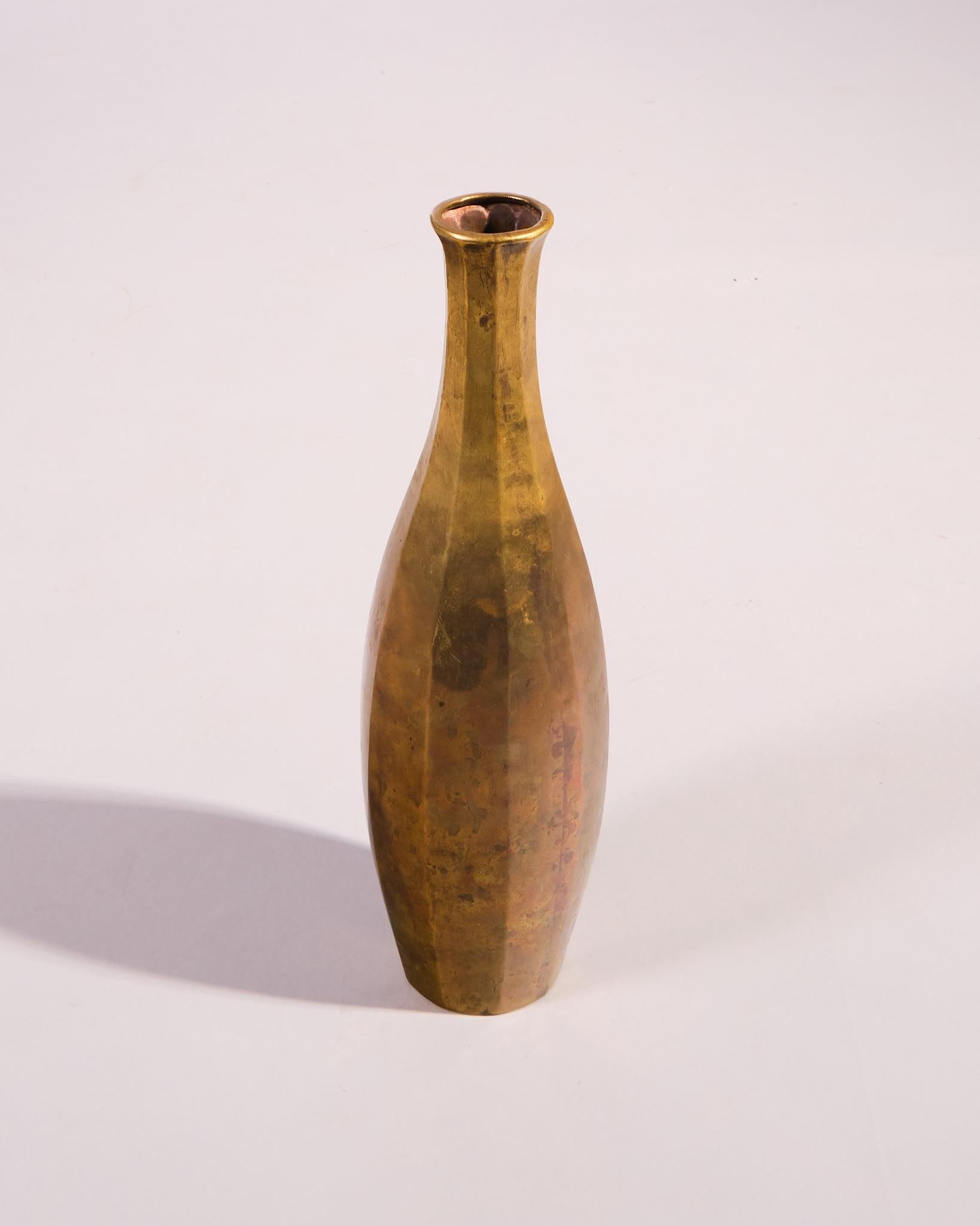 1920
Laiton et cuivre
Fabriqué en Italie
H39 cm