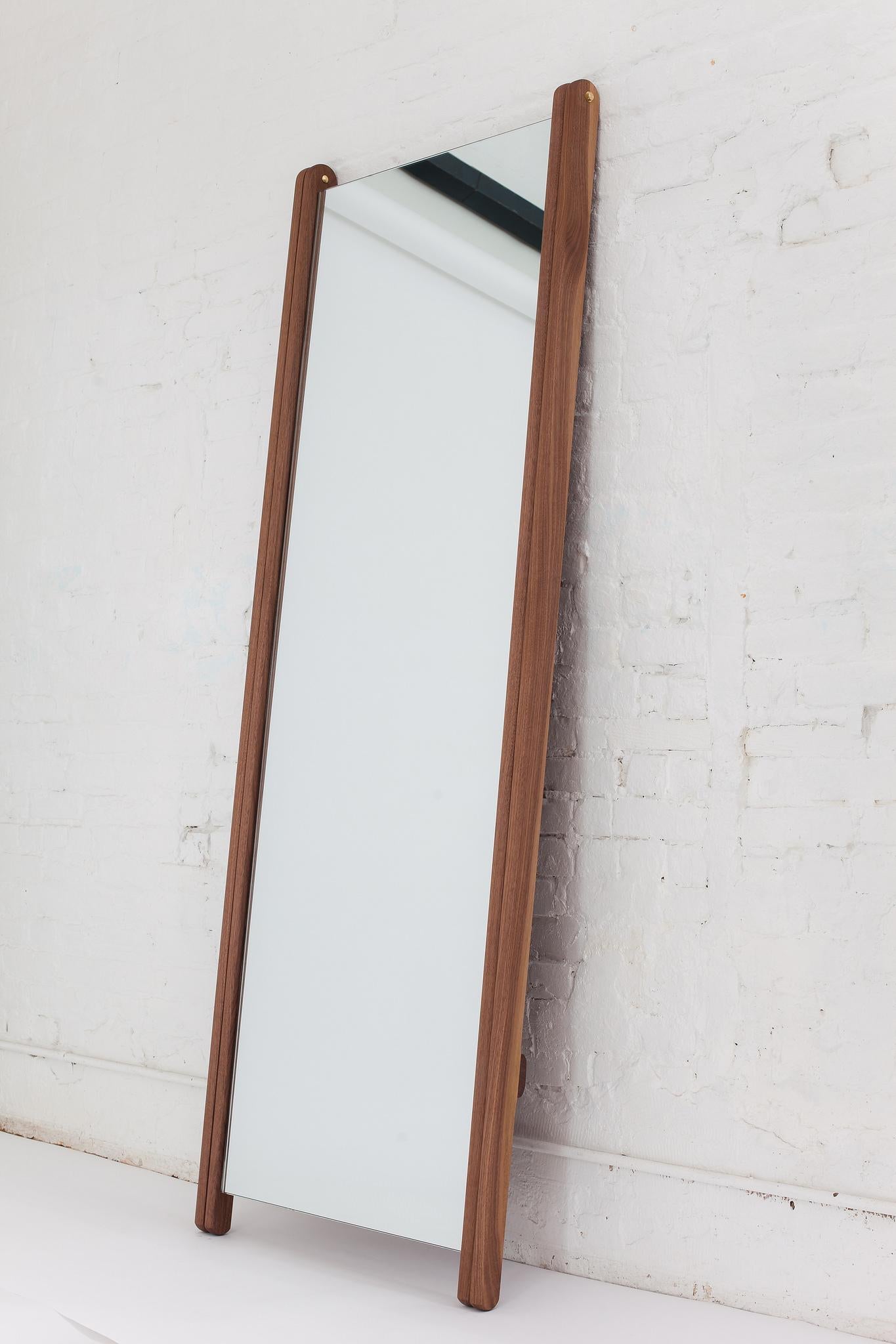 Large and luxurious, the Libertine mirror stands lightly on its tapered legs. Leave it open in the ‘compass’ position, or fold it flat to lean against the wall for a smaller footprint. A strong backing prevents the mirror from experiencing any