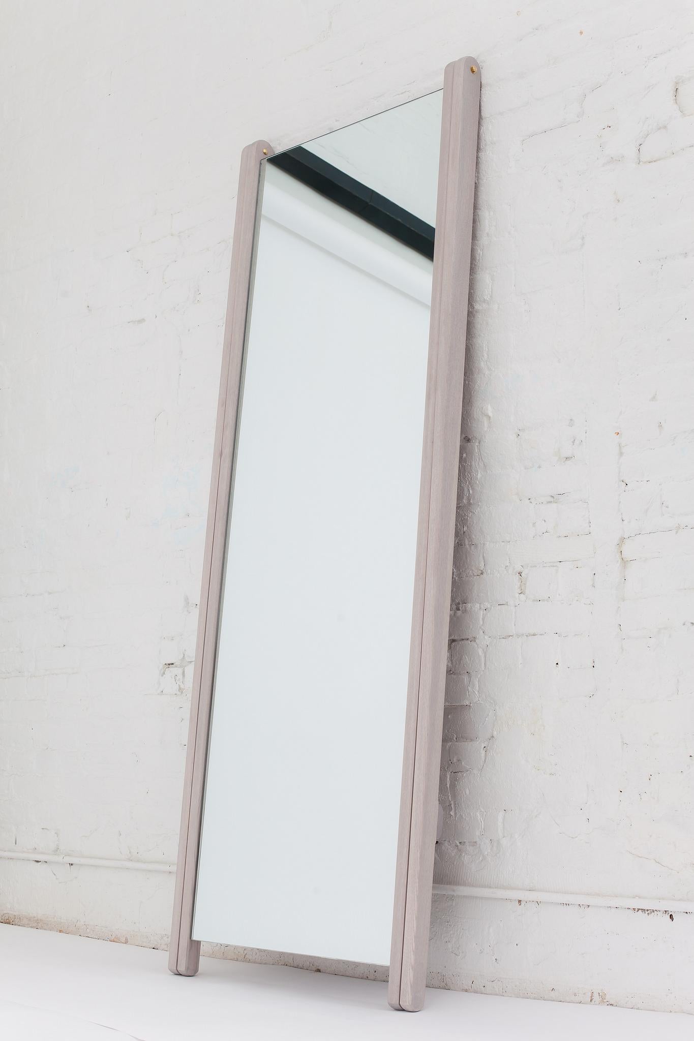 Large and luxurious, the Libertine mirror stands lightly on its tapered legs. Leave it open in the ‘compass’ position, or fold it flat to lean against the wall for a smaller footprint. A strong backing prevents the mirror from experiencing any