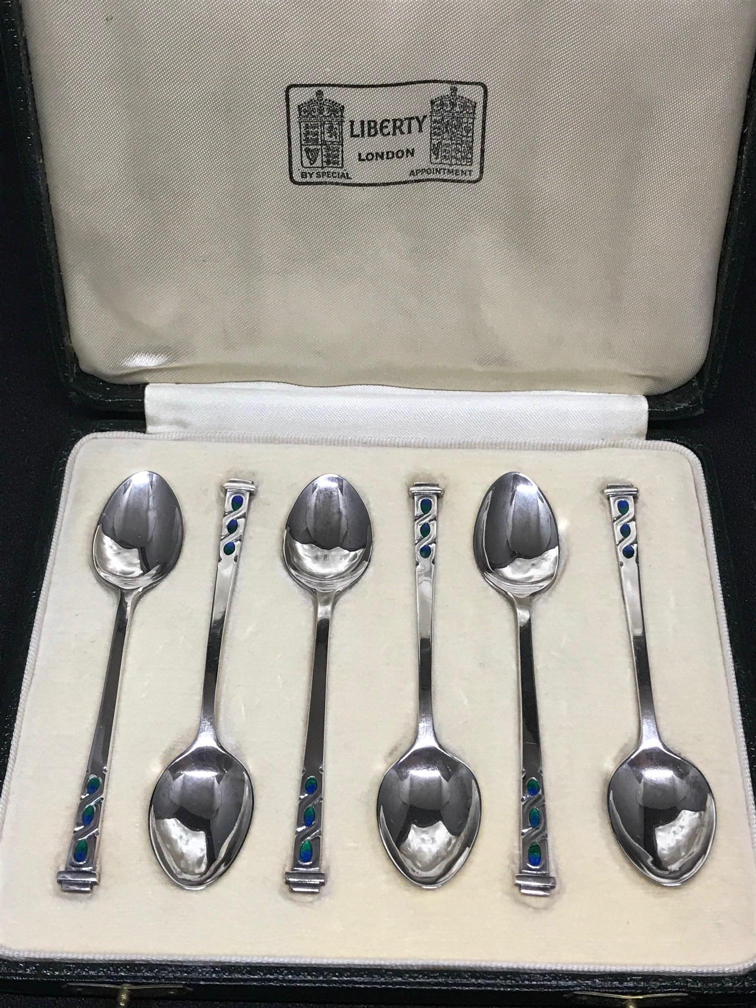 English Liberty, a Fine & Rare Set of Six Art Deco Silver & Enamel Cased Coffee Spoons