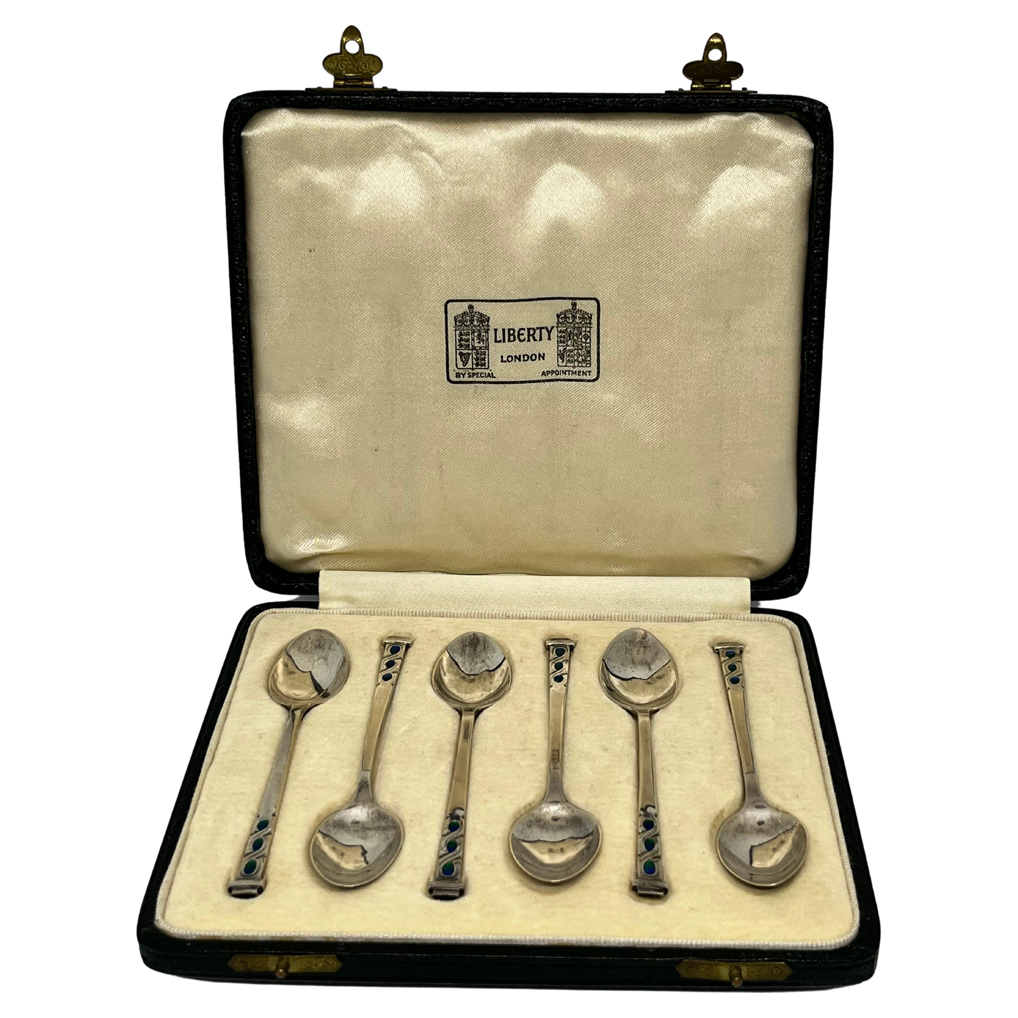 Liberty, a Fine & Rare Set of Six Art Deco Silver & Enamel Cased Coffee Spoons