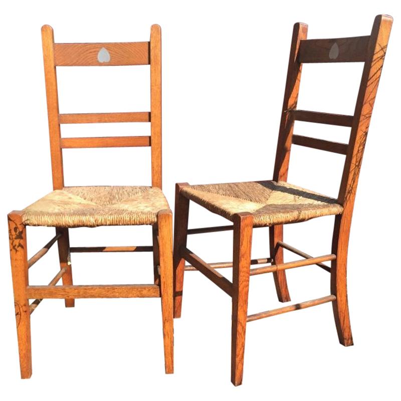 Liberty, A Pair of Arts & Crafts Oak Rush Seat Chairs Inlaid with Pewter Hearts