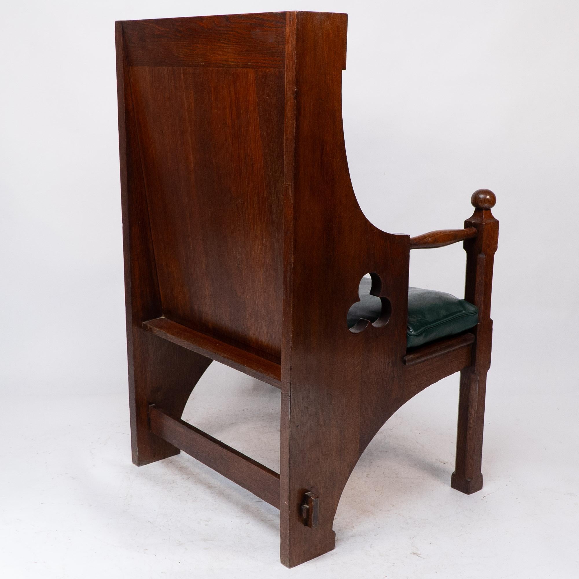 Liberty and Co. A good quality Arts and Crafts oak armchair with leather cushion For Sale 10