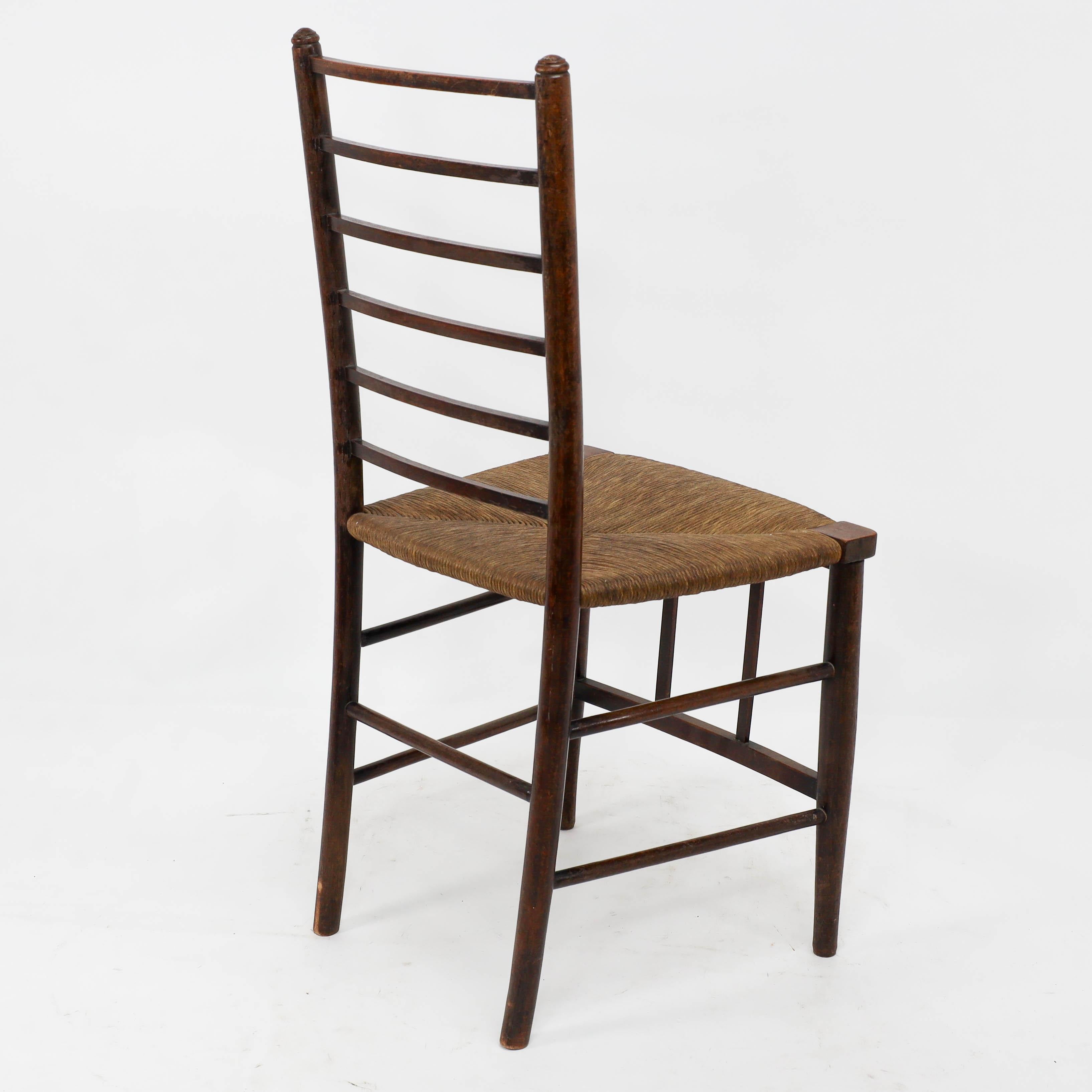 Liberty and Co, A pair of Arts and Crafts side chairs with finely rushed seats For Sale 3