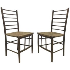 Liberty and Co, A Pair of Arts and Crafts Side Chairs with Finely Rushed Seats