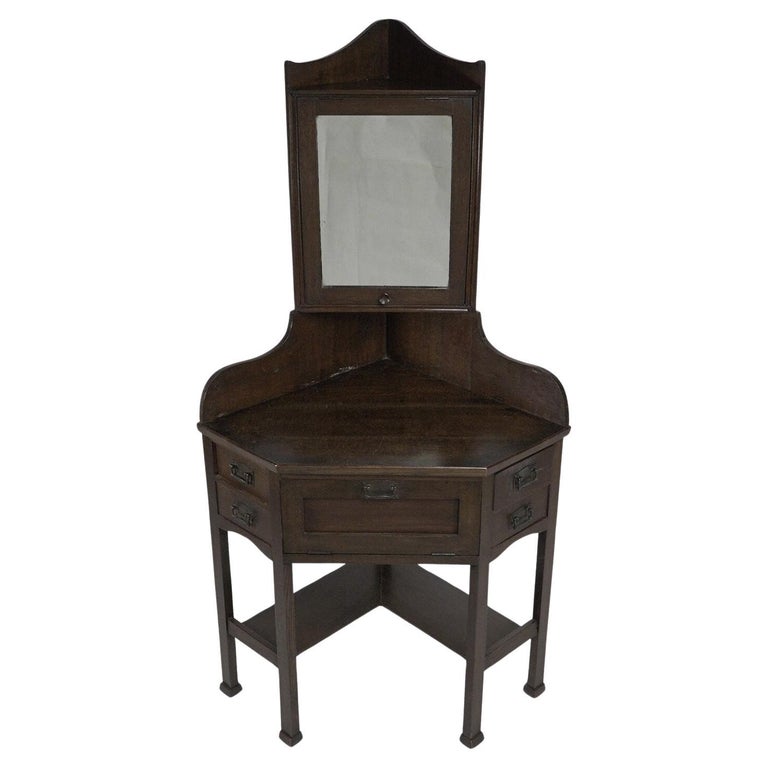 Liberty and Co. A rare and unusual Arts and Crafts oak corner dressing table  For Sale at 1stDibs | antique corner vanity table, unusual dressing tables,  vintage corner vanity