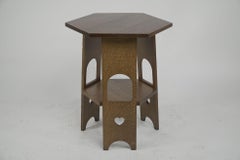 Liberty and Co. A scarce pair of Arts & Crafts oak side tables with plank sides