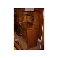Liberty and Co. A small 1/4 sawn oak Arts and Crafts sideboard