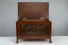 Liberty and Co. A small trunk with copper panels in the style of C R Mackintosh.