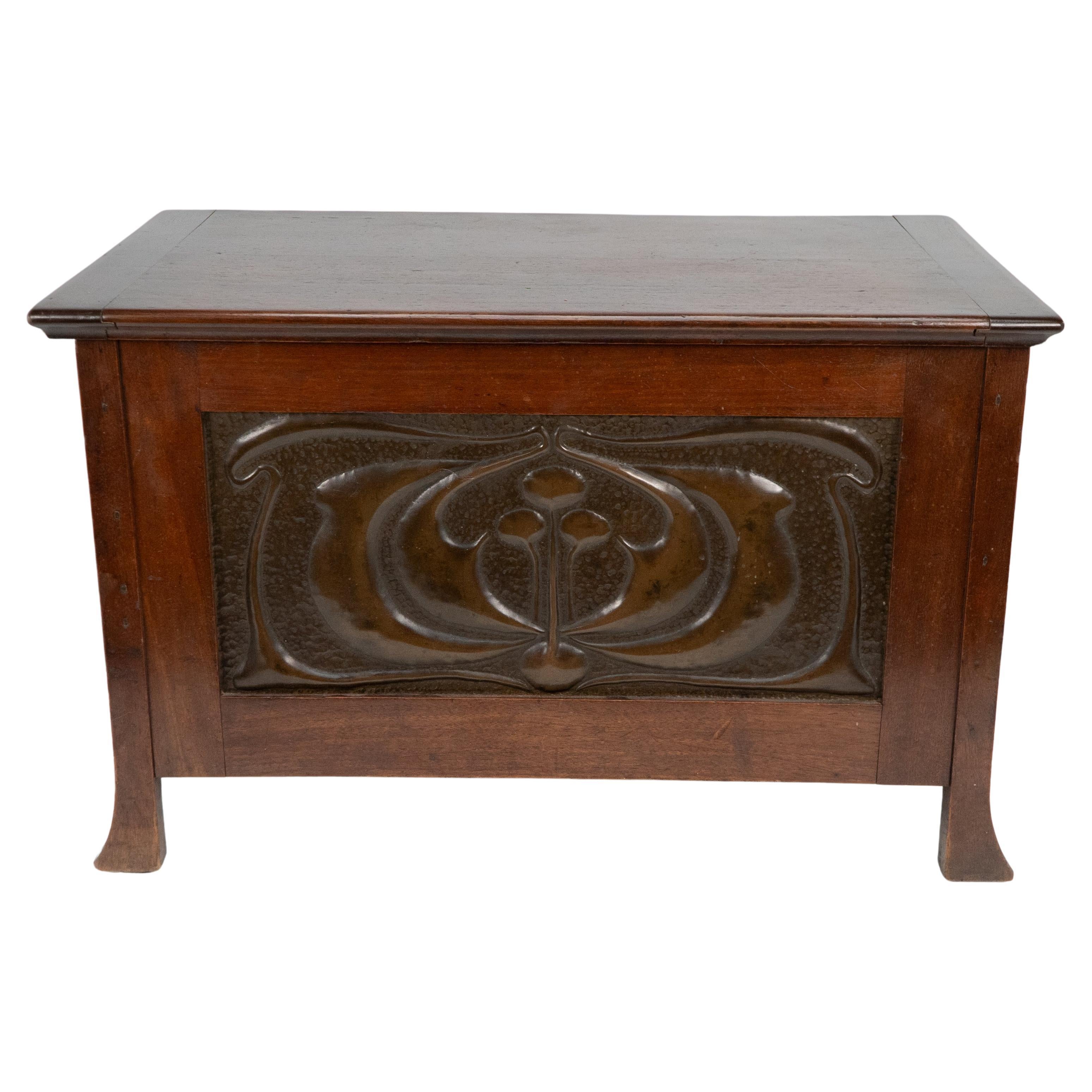 Liberty and Co. A small trunk with copper panels in the style of C R Mackintosh. For Sale