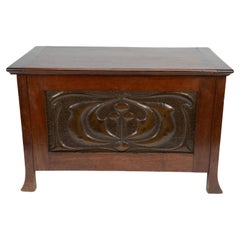 Liberty and Co. A small trunk with copper panels in the style of C R Mackintosh.