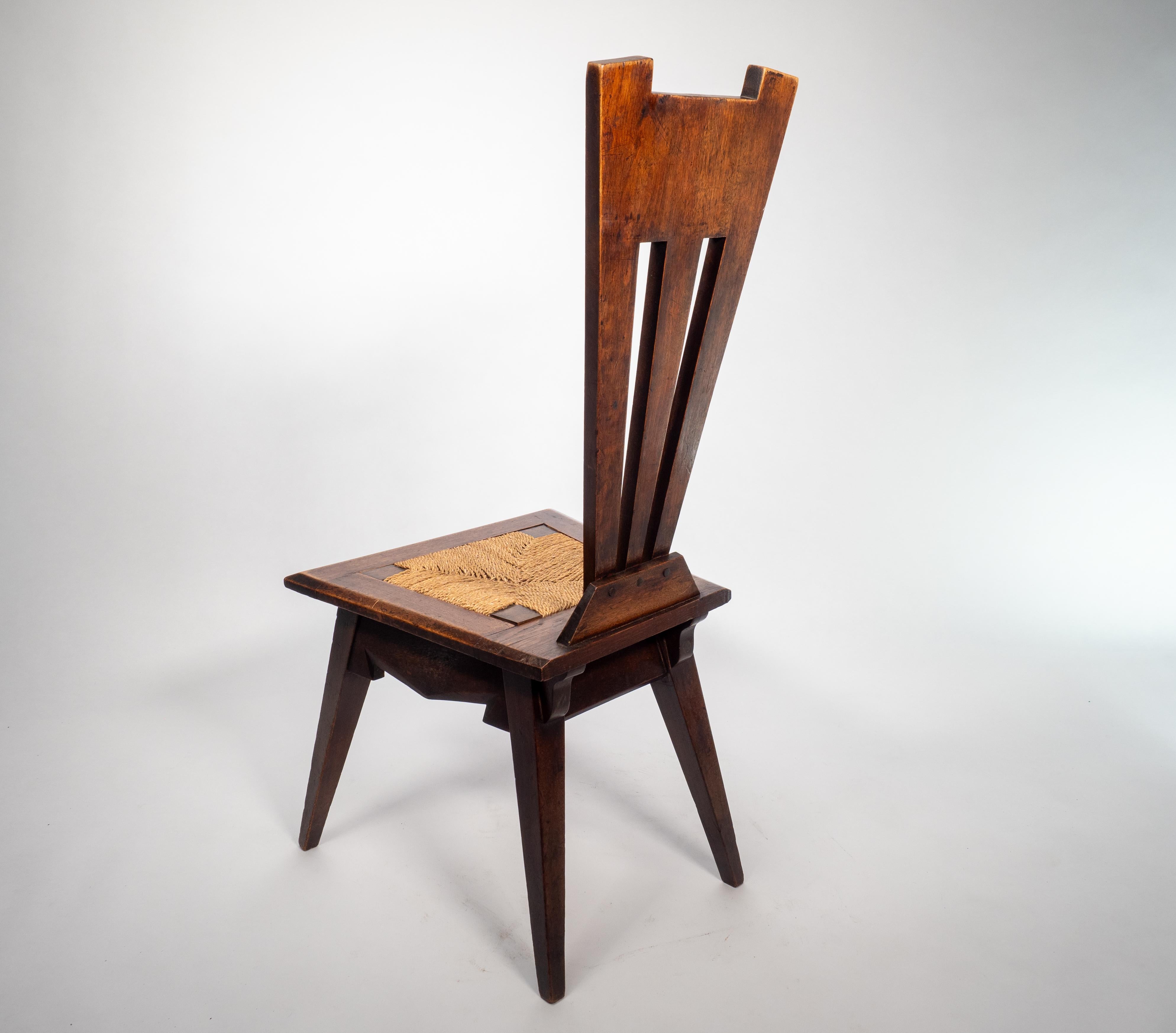 Liberty and Co. An Arts and Crafts Wiclif rush seat side chair. In Good Condition For Sale In London, GB