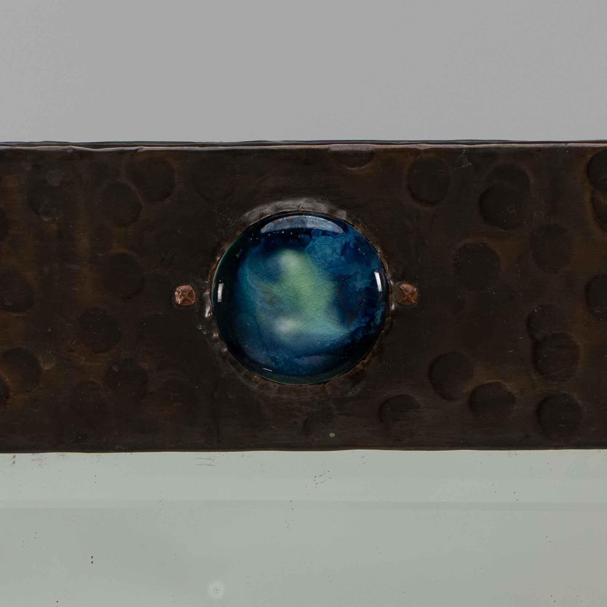 Liberty and Co. An Arts and Crafts copper mirror with a cloudy blue Ruskin Jewel In Good Condition For Sale In London, GB
